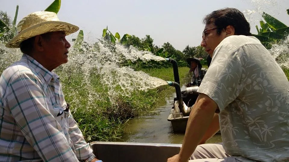 TFA Director with farmer